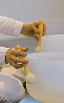 Playing-Crystal-Singing-Bowls