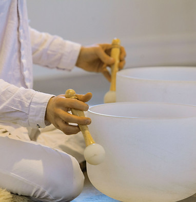 Playing-Crystal-Singing-Bowls
