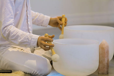 Playing-Crystal-Singing-Bowls