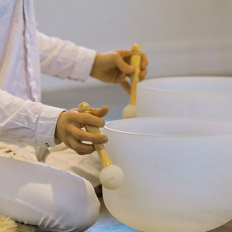 Playing-Crystal-Singing-Bowls