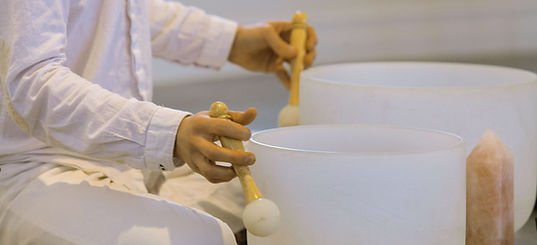Playing-Crystal-Singing-Bowls