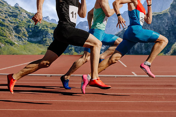 Athletes Sprinting Outdoors