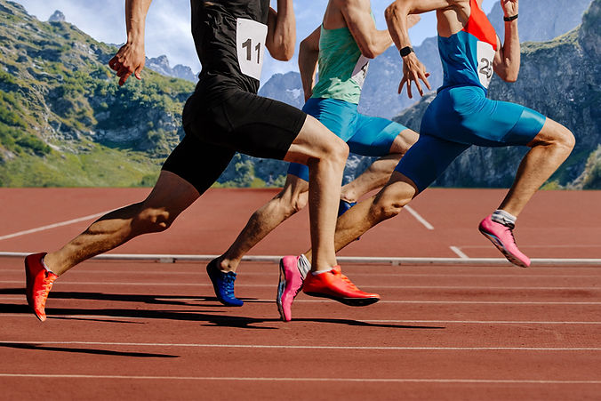 Athletes Sprinting Outdoors