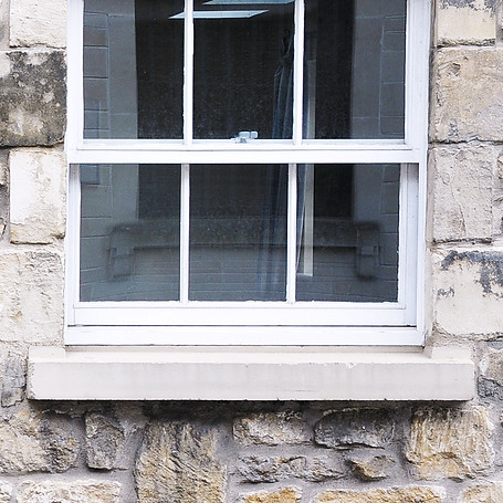Close-up of a white window cill