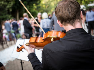 A musician playing at a wedding