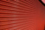red metal shutter security door on a shop front. Image shot 2008. Exact date unknown