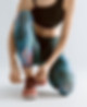 Kneeling to Tie Shoe