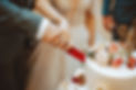 Couple Cutting Wedding Cake