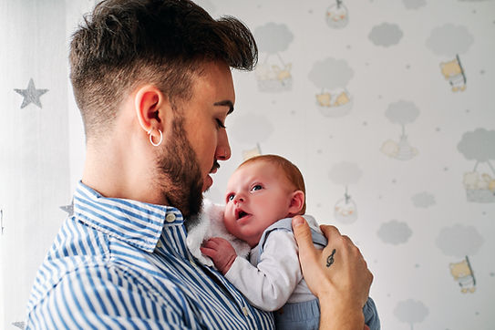 Father Holding Baby