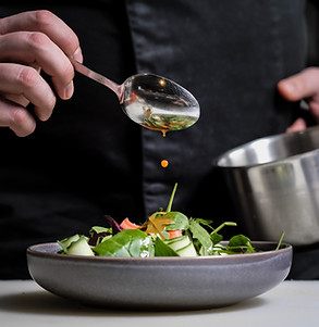 A man preparing a salad
