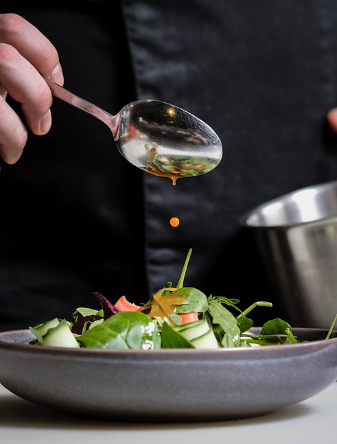 A Man Preparing a Salad