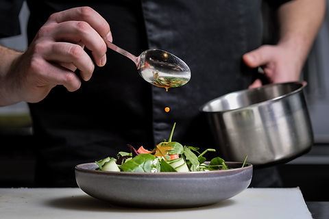 A Man Preparing a Salad