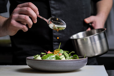 A Man Preparing a Salad