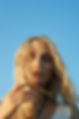 Portrait Against Blue Sky