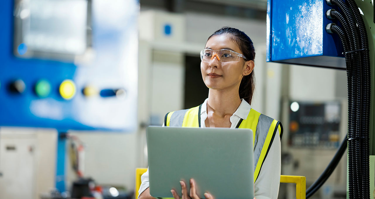 A female employee doing QC