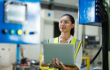 A female employee doing QC