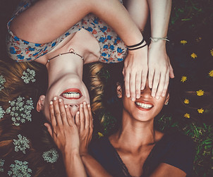 Friends Covering Eyes