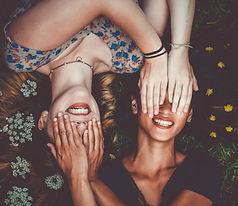 Friends Covering Eyes