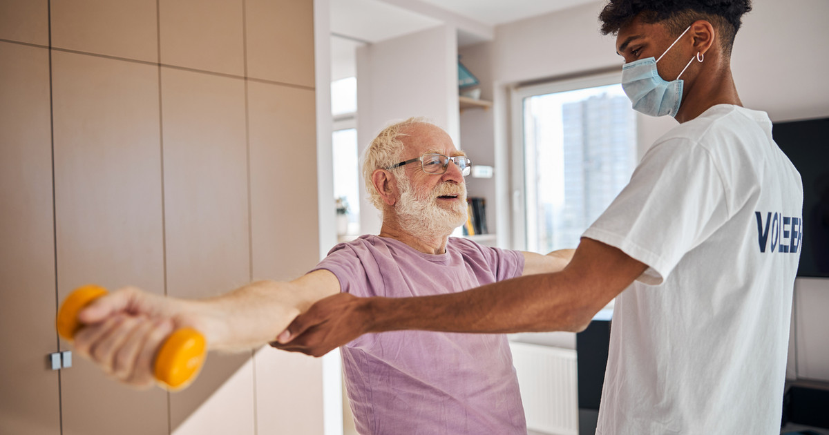 A person participating in exercise with support from their healthcare team, demonstrating how medicines can assist participation in a broader pain management plan.