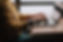 Typing on a laptop