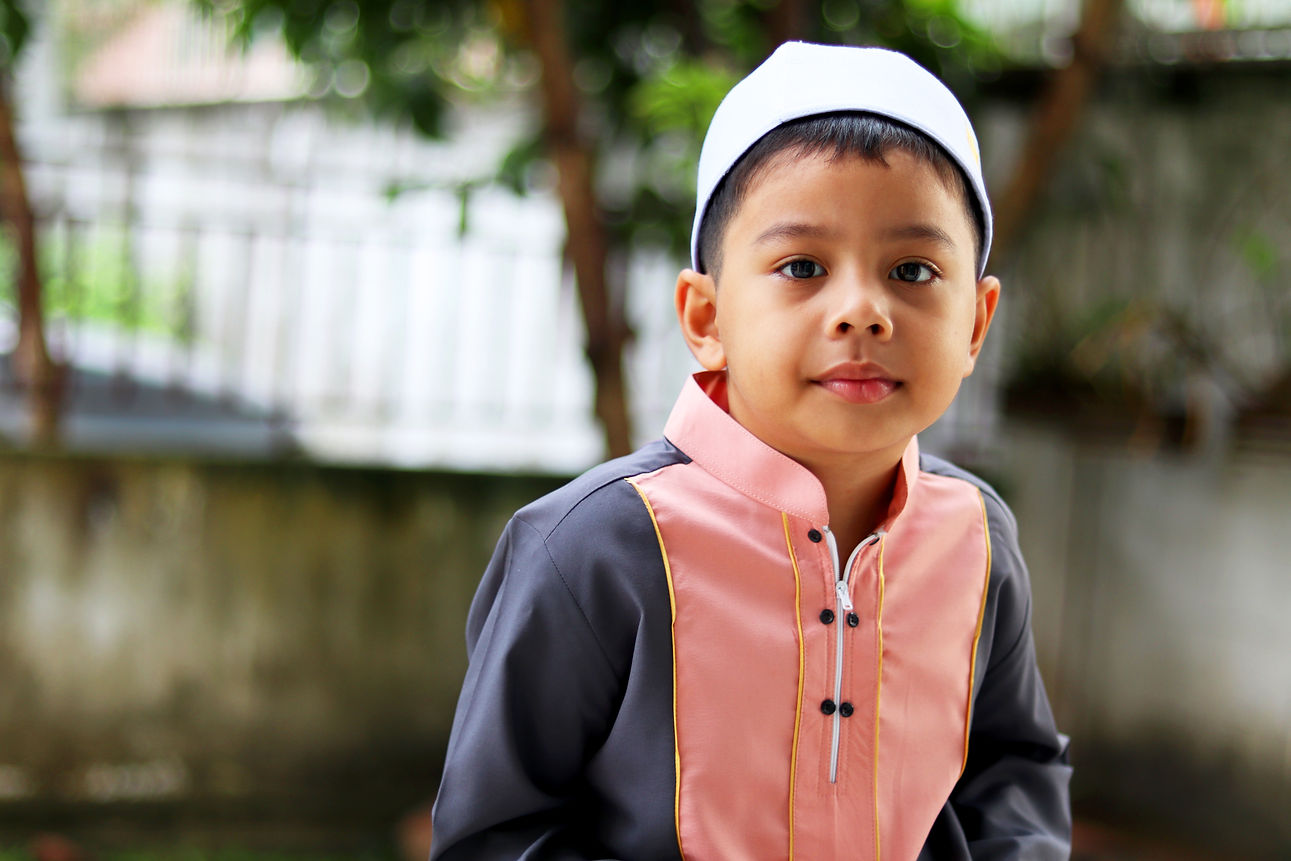 Muslim Boy with White Hat