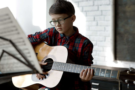 Boy Playing Guitar
