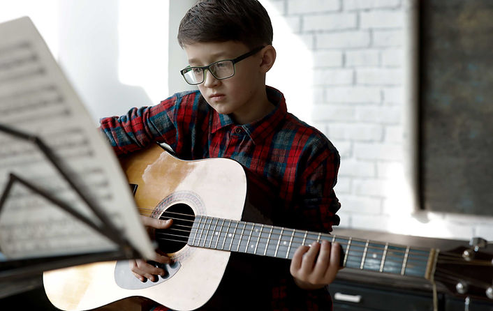Boy Playing Guitar