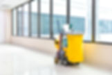 Cleaning tools cart wait for cleaning,Yellow mop bucket and set of cleaning equipment in t