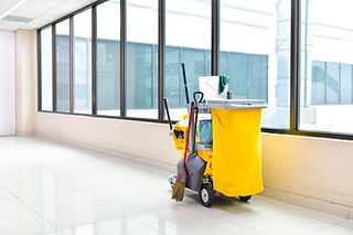 Cleaning tools cart wait for cleaning,Yellow mop bucket and set of cleaning equipment in t