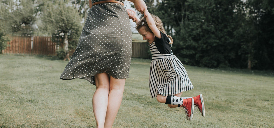 Playful Mother and Daughter