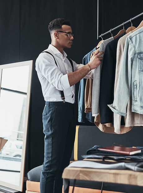 Man Selecting Clothing