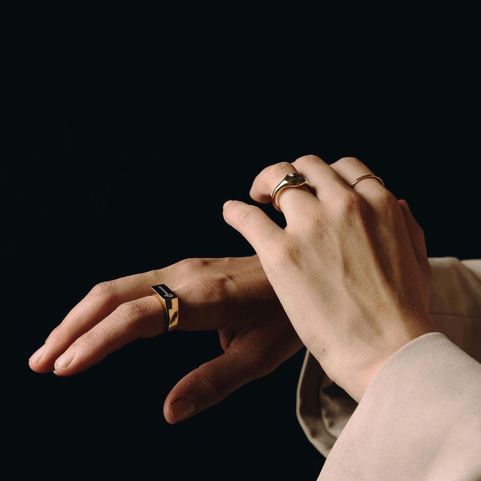 Close-up view of fingertips gently tapping on the side of the hand