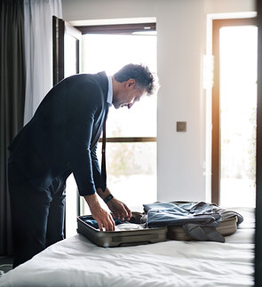 Man Packing Luggage