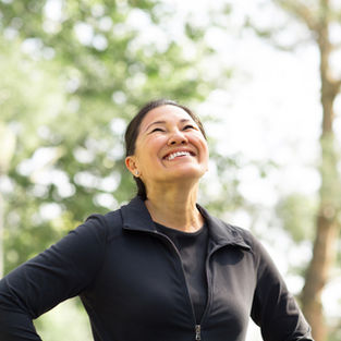 woman smiling outdoor in a sunny day