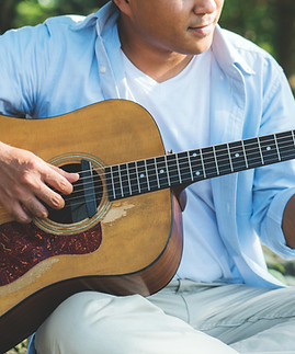 Playing a Guitar