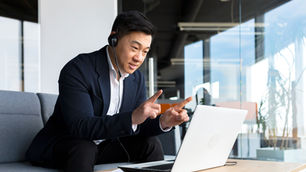 Professional practicing business English skills in an online lesson with an ESLVista teacher