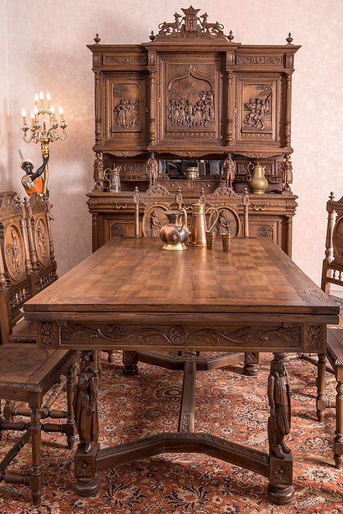 Antique dining table with jugs and glasses