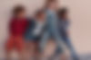 Cute Kids Posing Against Wall