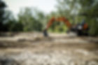 mini excavator in field