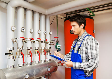 A technician inspecting a heating system