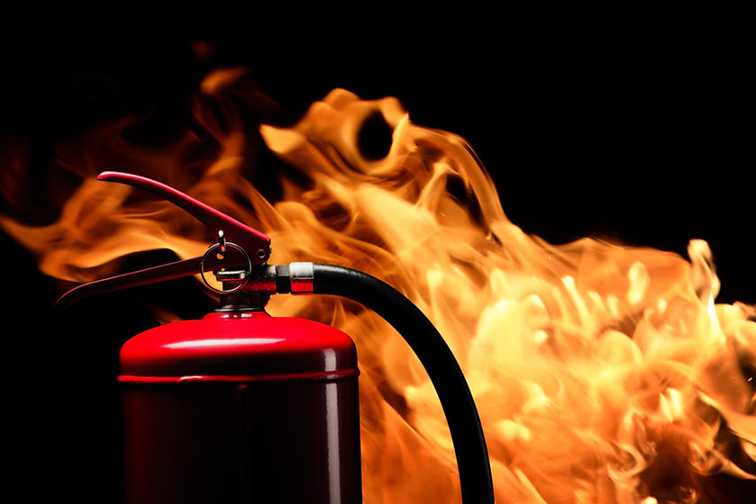 fire-extinguisher on flame background