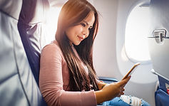 Happy woman on plane