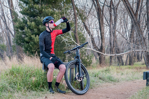 Cyclist Drinking Outdoors