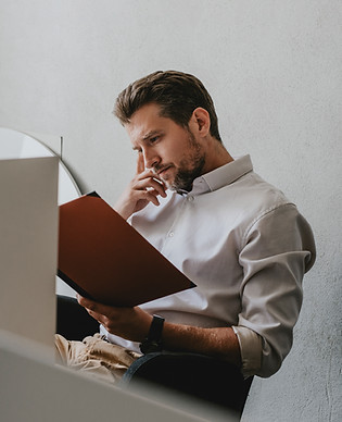 Man Reading Document
