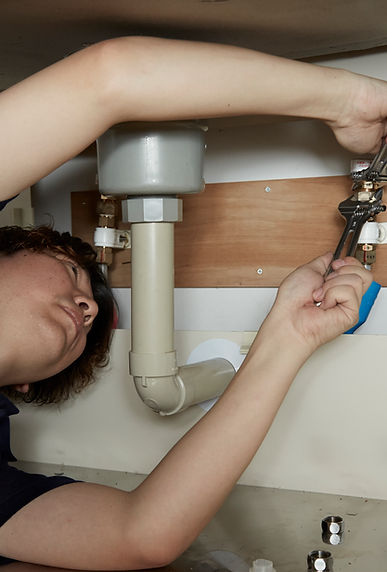 Plumber Fixing Sink