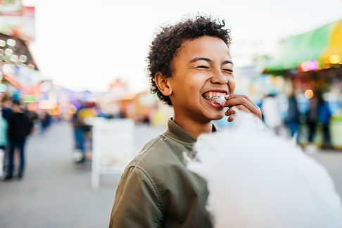 Child Eating Cotton Candy