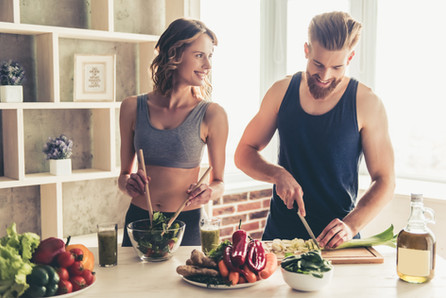 Men's Health - Couple prepping meal