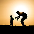 Silhouette of Father and Child
