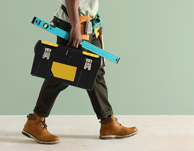 Worker Carrying Tools