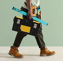 Worker Carrying Tools